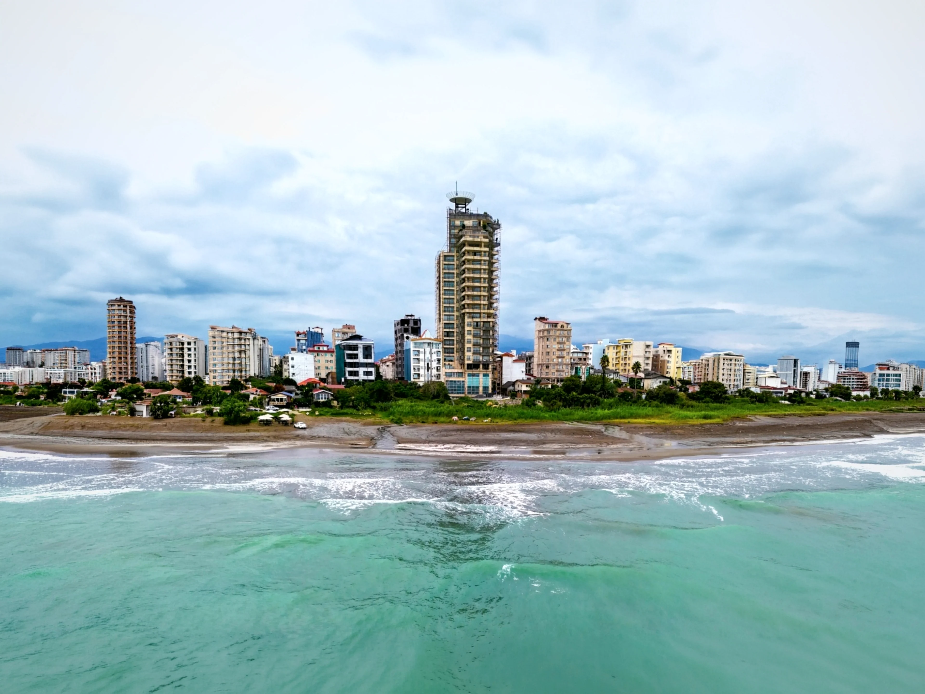 Maghrebi Tower standing on the shoreline with open sea behind it