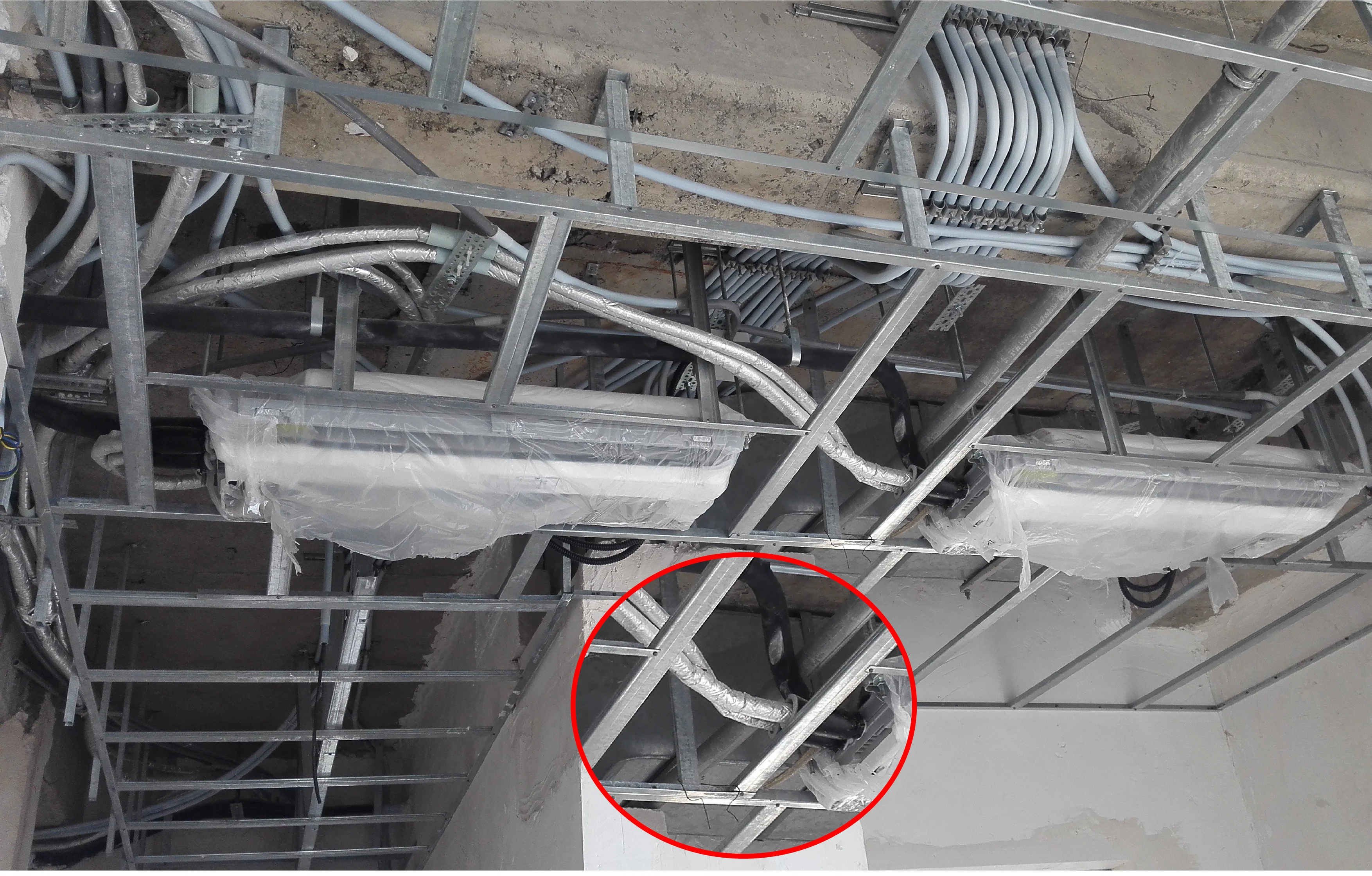 VRF ceiling cassette installed with One Flex elastomeric insulation.
